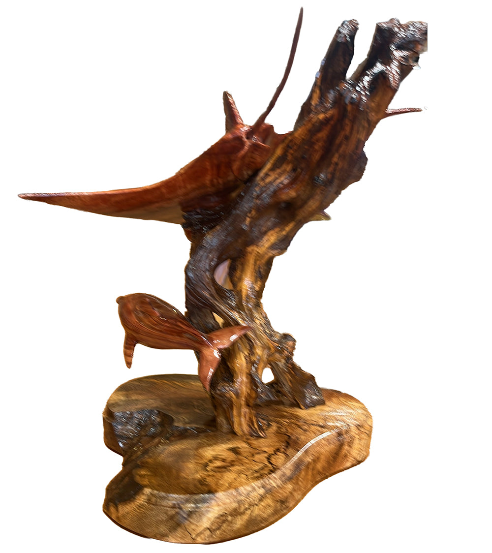 Escultura de madera de koa "Lazos familiares" de Craig Nichols