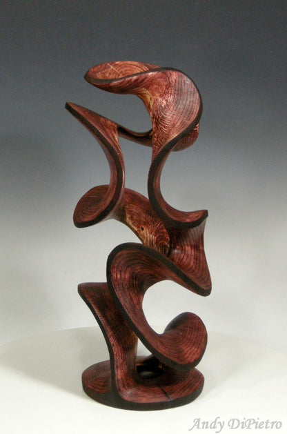 Carved Sculpture "Burgundy Twist" by Andy DiPietro