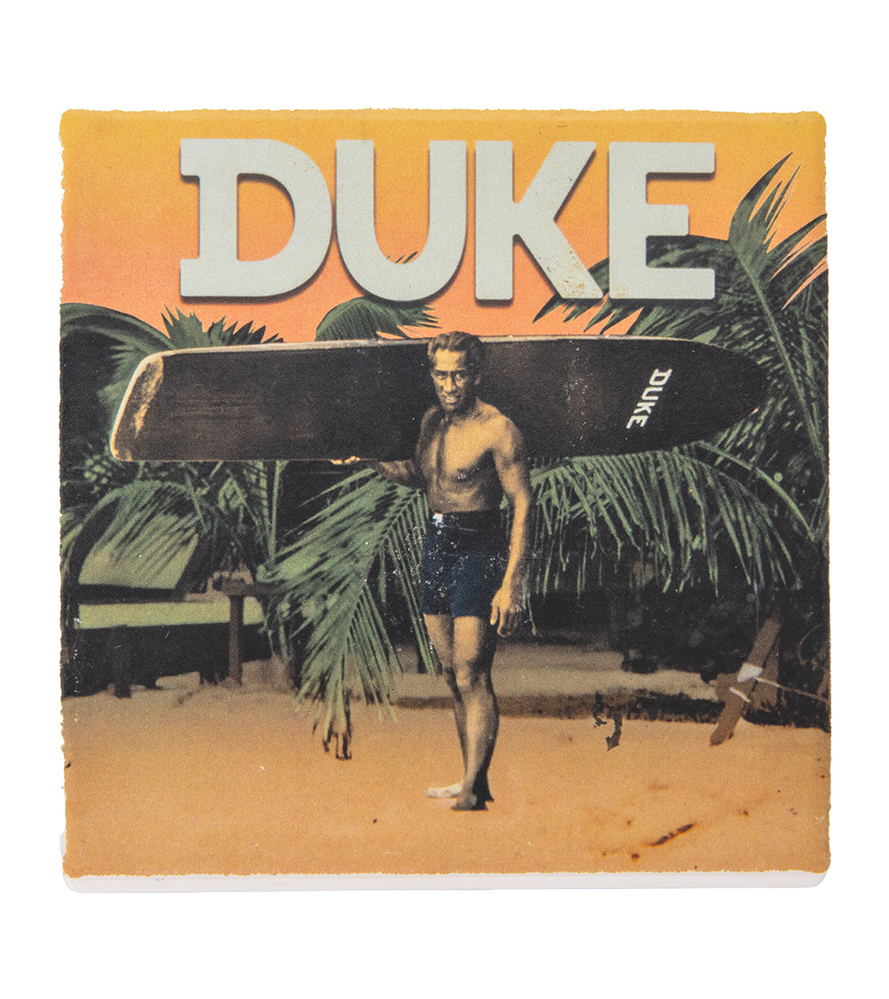 Duke Sandstone Coaster – Duke Carrying his Board