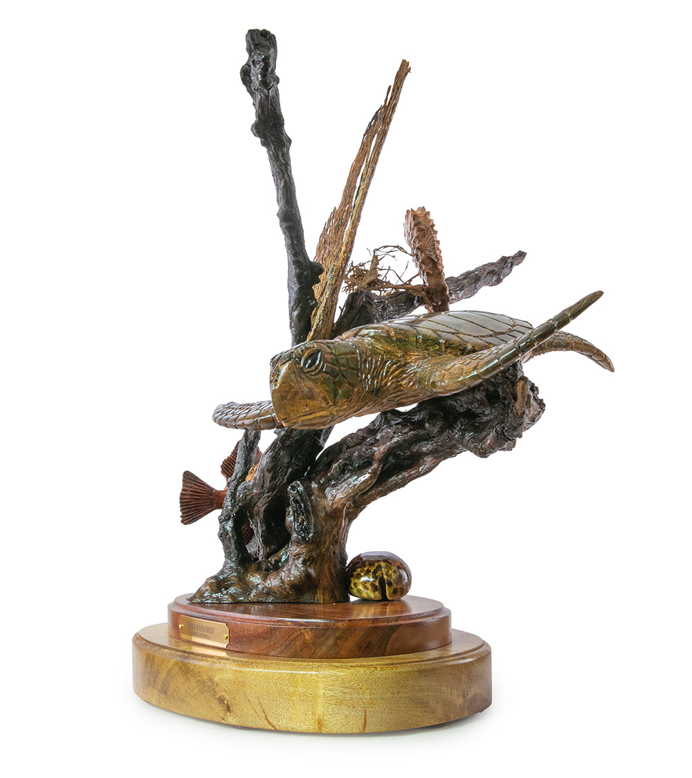 Escultura de madera de koa "Explorador de arrecifes" de Craig Nichols