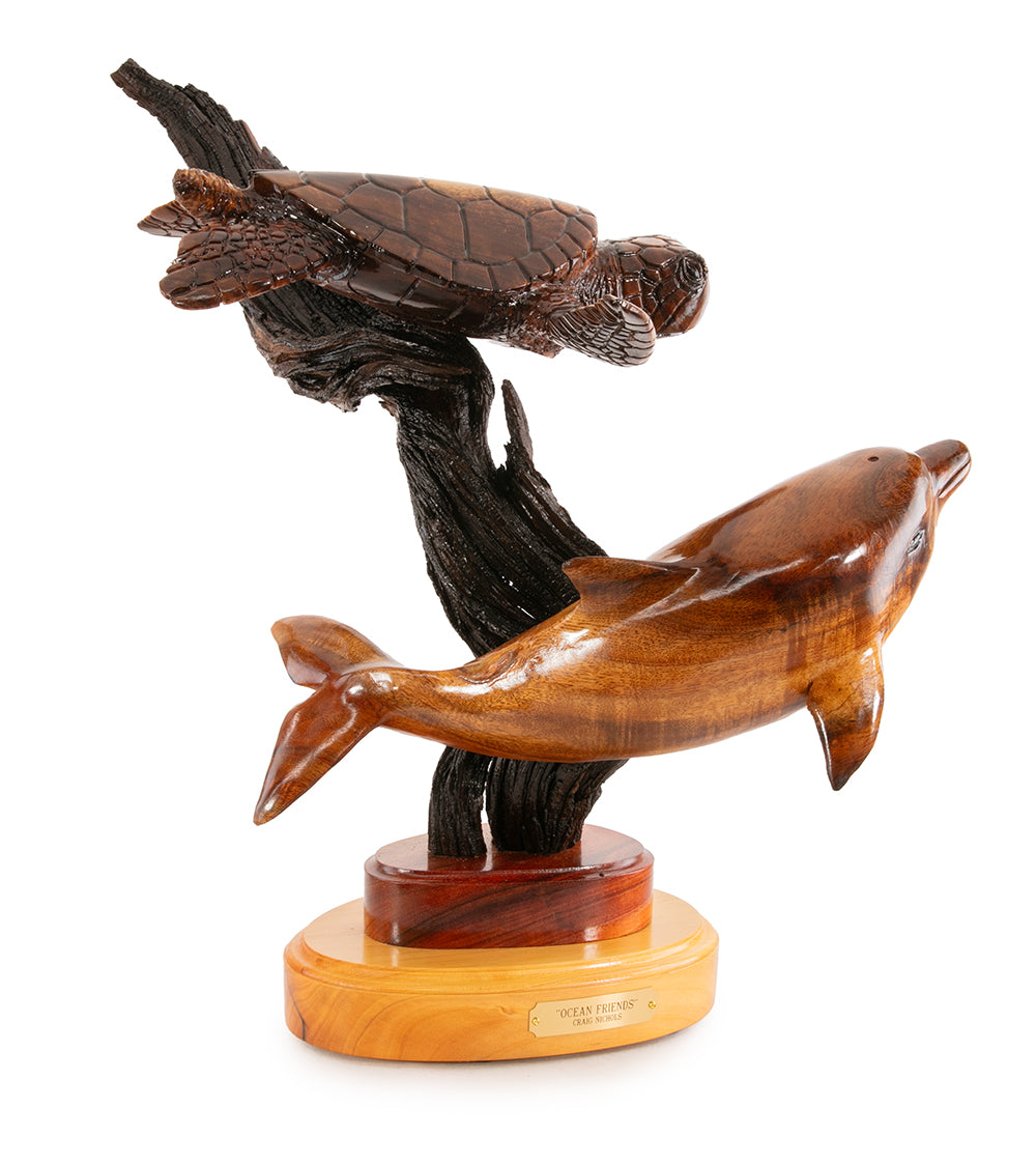 Escultura de madera de koa "Amigos del océano" de Craig Nichols