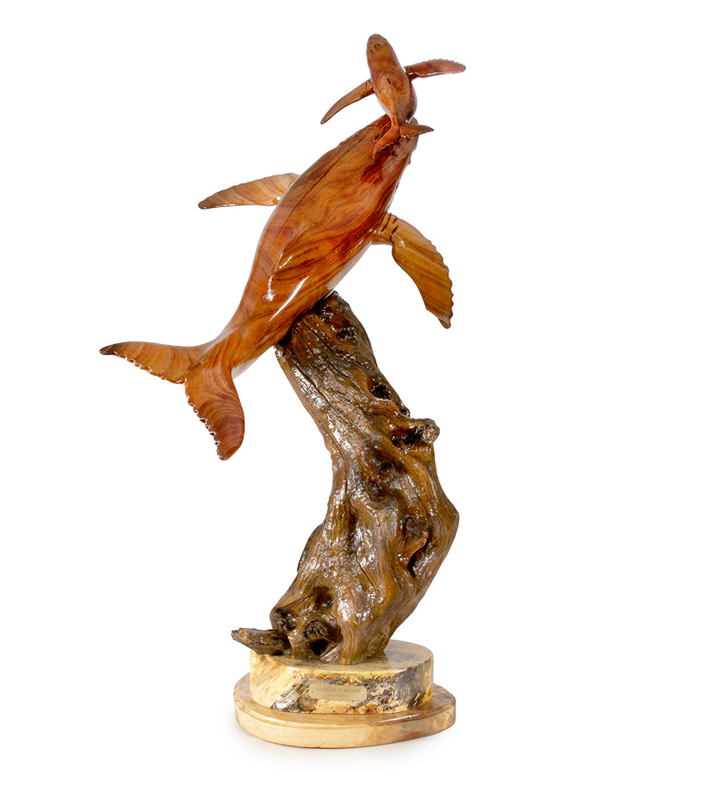 Escultura de madera de koa "Lazos familiares" de Craig Nichols