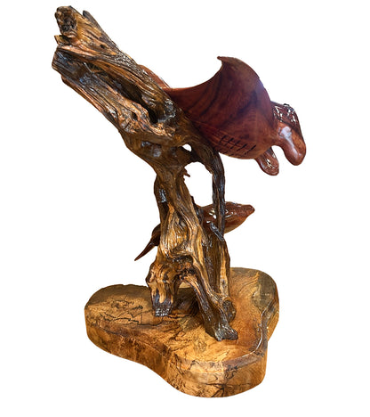 Escultura de madera de koa "Lazos familiares" de Craig Nichols